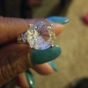 White sapphire and diamond ring